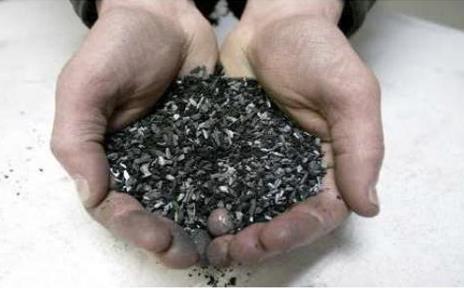 A handful of biochar produced from bamboo biomass